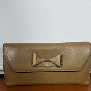 Chloe Tan Leather Clutch with Gold Bow Accent